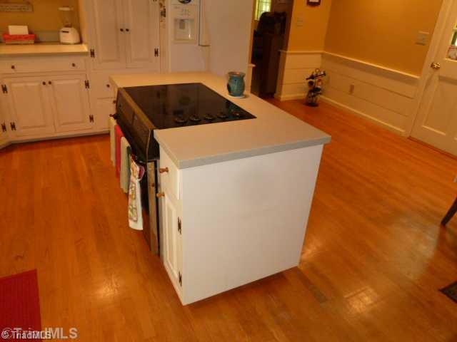 1100 Hemlock Ridge Road Germanton, NC 27019 - Photo 6 of 16 Kitchen. Convenient Kitchen Island. You can never get too much counter space.