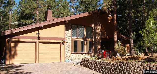 266 Chimney Rock Road Stateline, NV 89449 - Photo 1 of 9 a view of a house with a tree