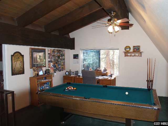 266 Chimney Rock Road Stateline, NV 89449 - Photo 7 of 9 a room with furniture and view of chandelier