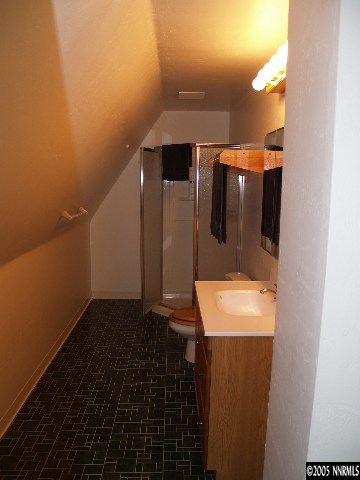266 Chimney Rock Road Stateline, NV 89449 - Photo 8 of 9 a bathroom with a sink and mirror