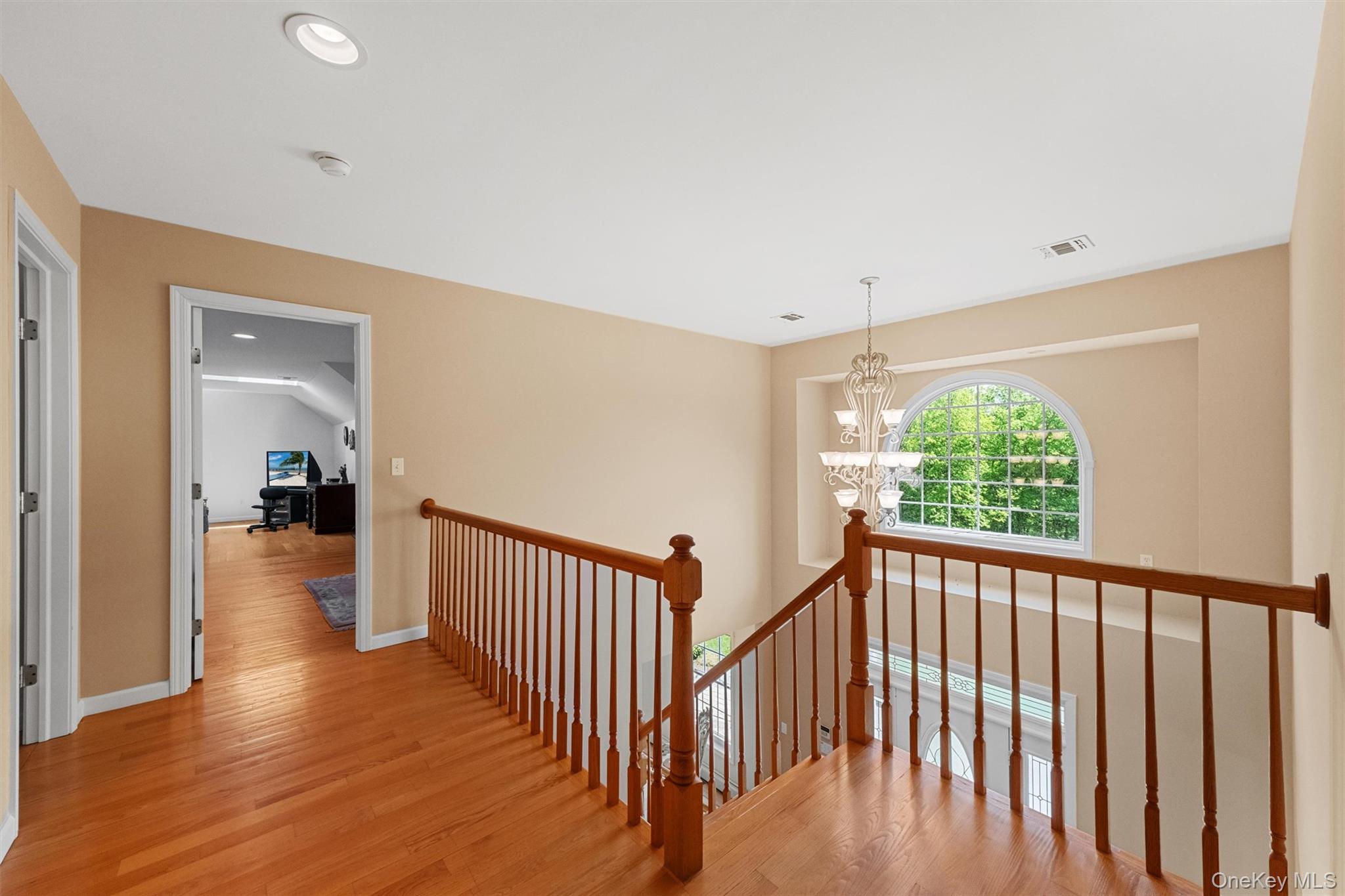 20 Goshen Road Chester, NY 10918 - Photo 21 of 38 a view of a hallway with wooden floor and stairs