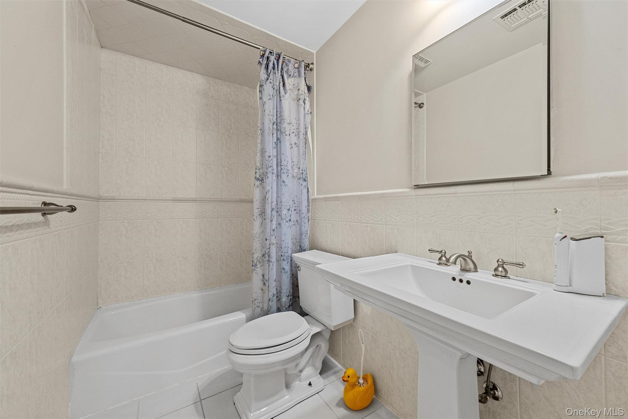 20 Goshen Road Chester, NY 10918 - Photo 24 of 38 a bathroom with a sink a toilet and shower
