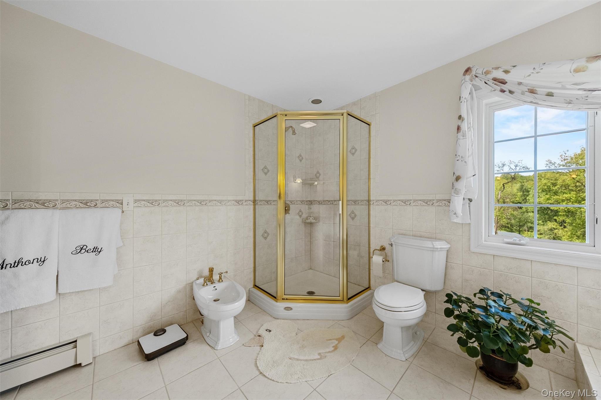20 Goshen Road Chester, NY 10918 - Photo 28 of 38 a white toilet sitting next to a bathroom sink
