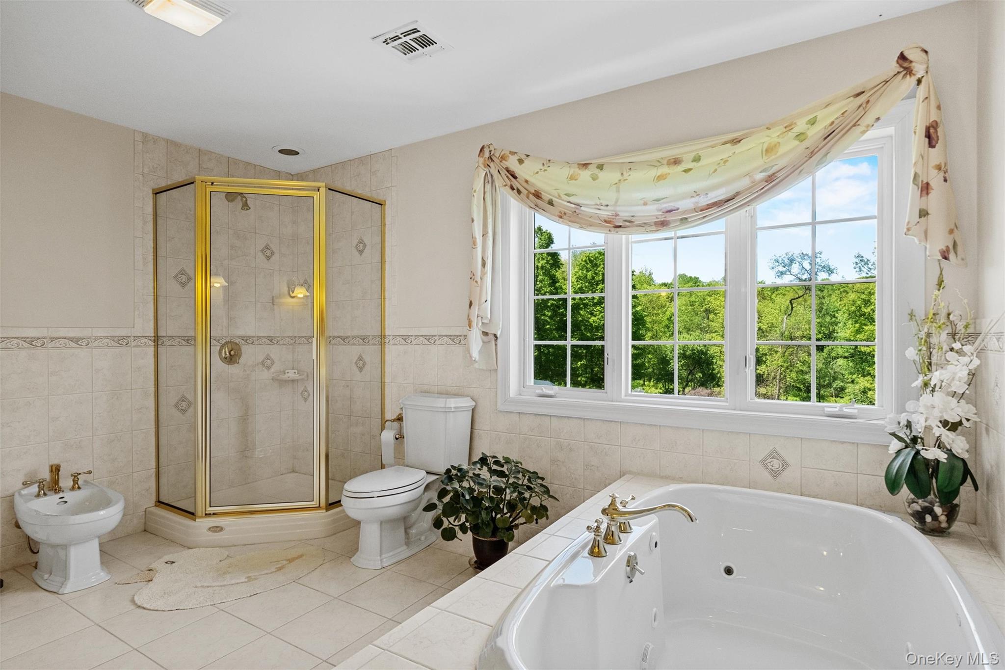 20 Goshen Road Chester, NY 10918 - Photo 31 of 38 a bathroom with a bathtub toilet and large window