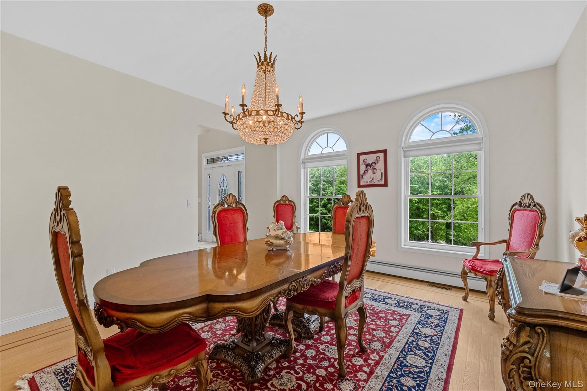 20 Goshen Road Chester, NY 10918 - Photo 6 of 38 a view of a dining room with furniture and a chandelier