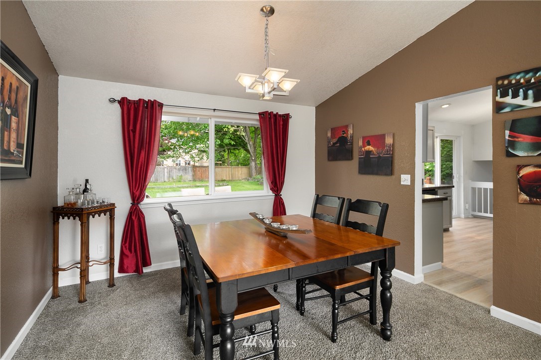 2329 169th Place Southeast Bothell, WA 98012 - Photo 4 of 18 a view of a dining room with furniture window and outside view