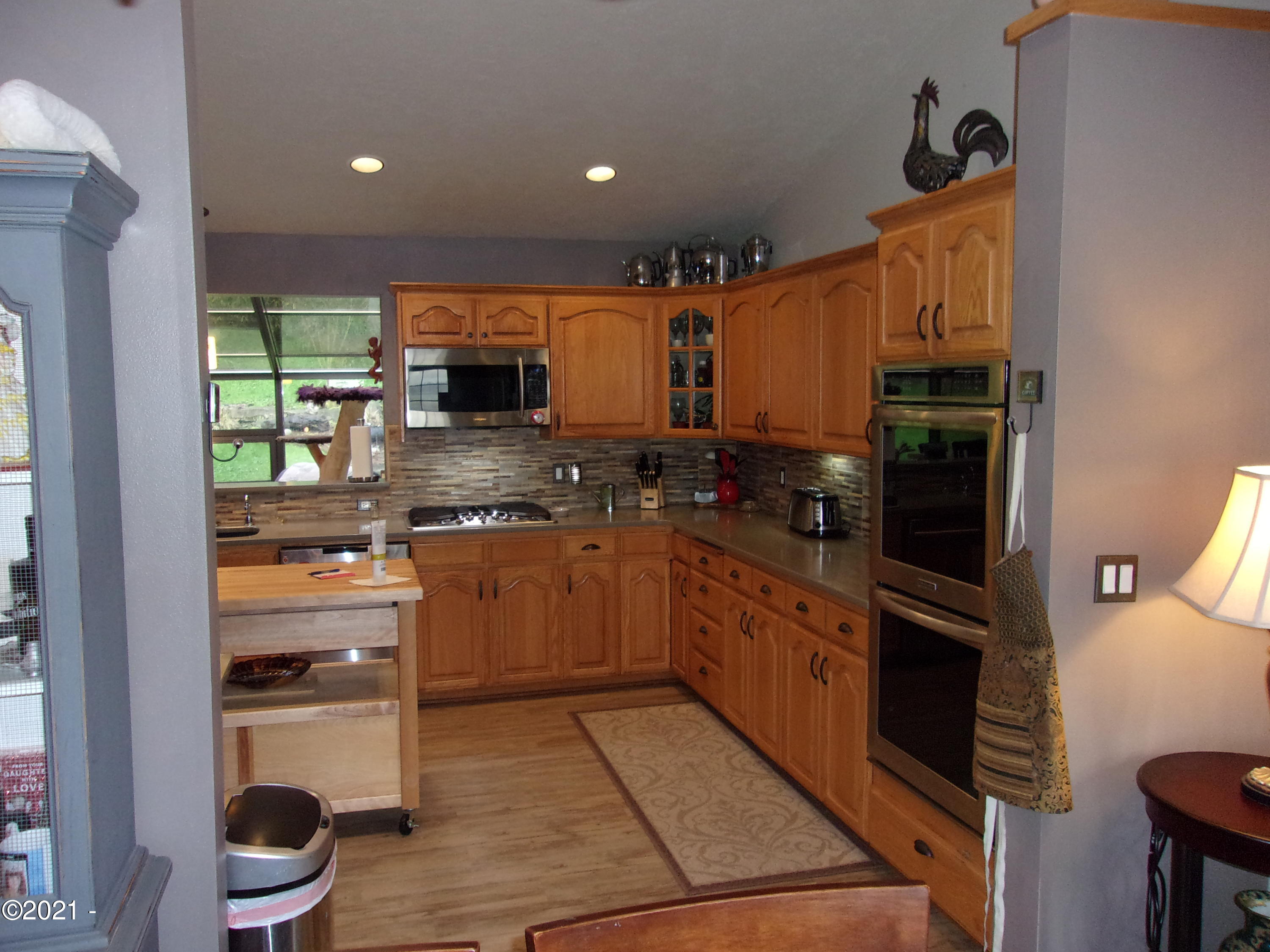 3065 Yaquina Bay Road Newport, OR 97365 - Photo 12 of 32 Dining to Kitchen