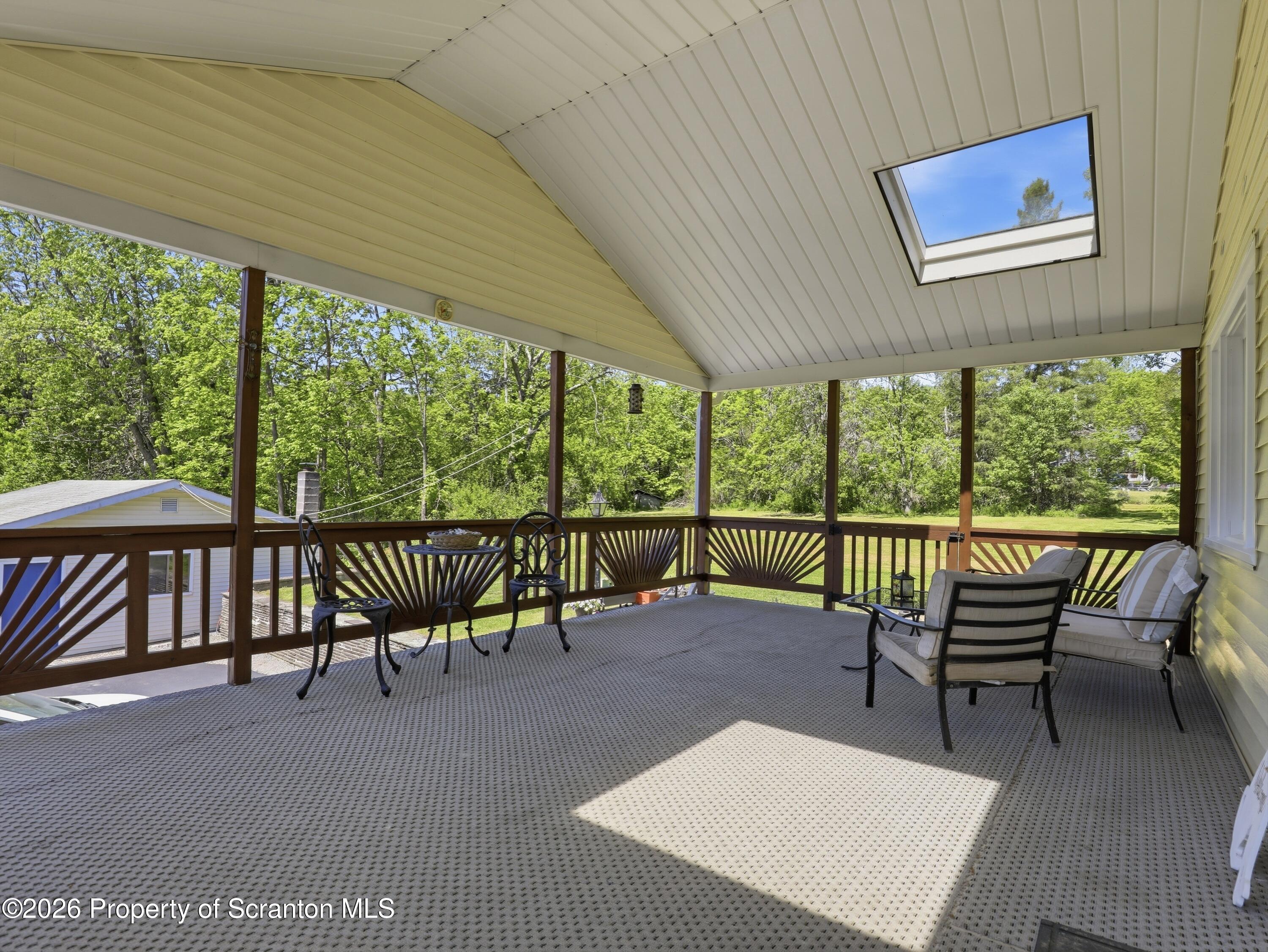 1237 Heart Lake Road Scott Township, PA 18433 - Photo 26 of 39 a balcony with furniture and a large window