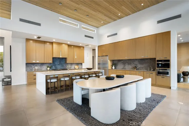a hallway with a view of living room