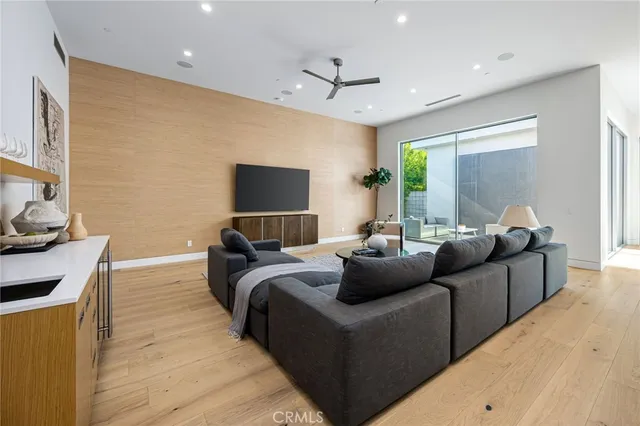a view of house with yard outdoor seating and trampoline