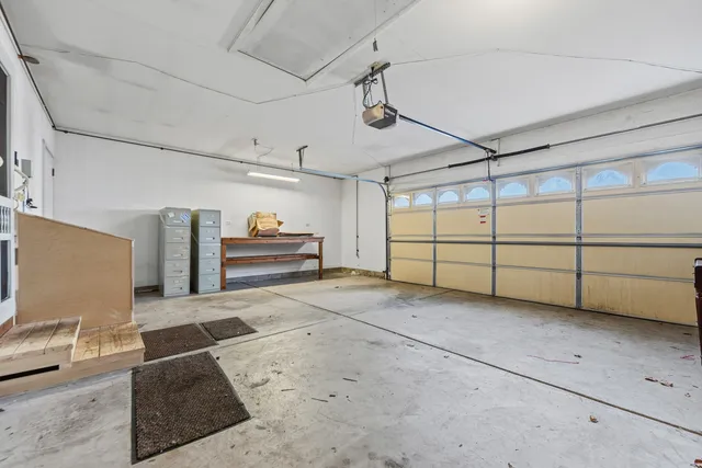 a view of a porch with wooden fence