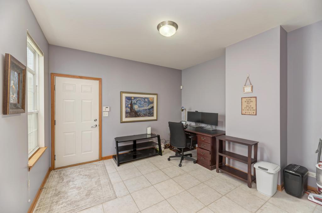 1846 Keystone Place Schaumburg, IL 60193 - Photo 15 of 30 a view of a workspace with furniture and a window