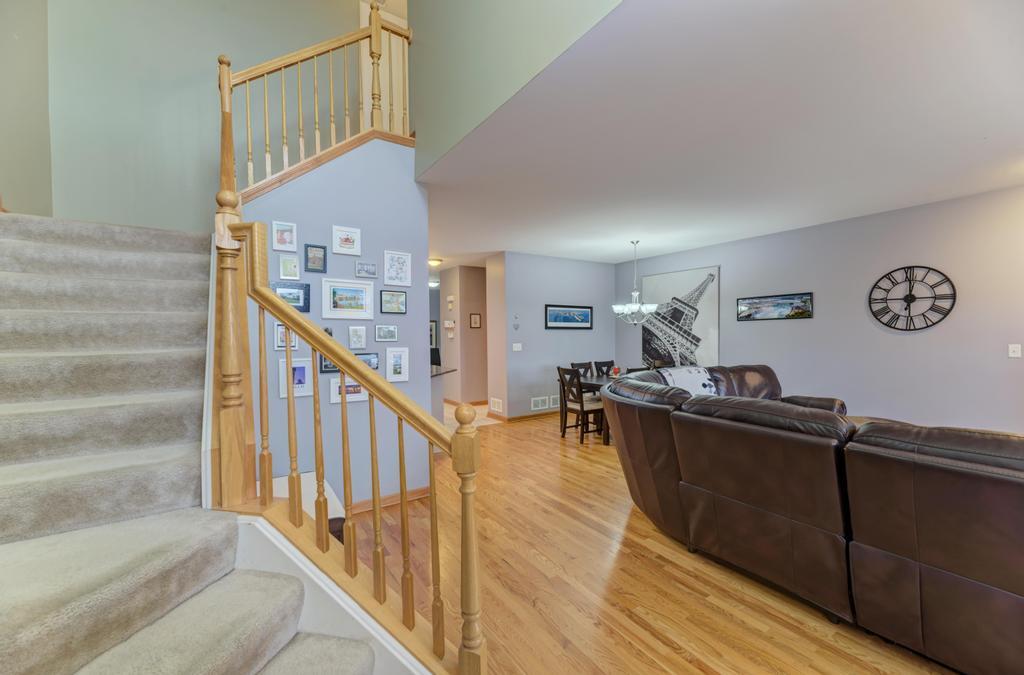 1846 Keystone Place Schaumburg, IL 60193 - Photo 17 of 30 a living room with furniture and a wooden floor