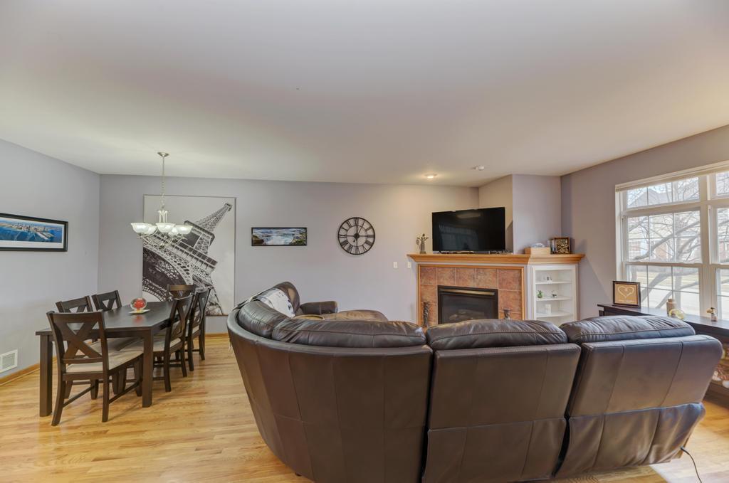 1846 Keystone Place Schaumburg, IL 60193 - Photo 3 of 30 a living room with furniture and a flat screen tv
