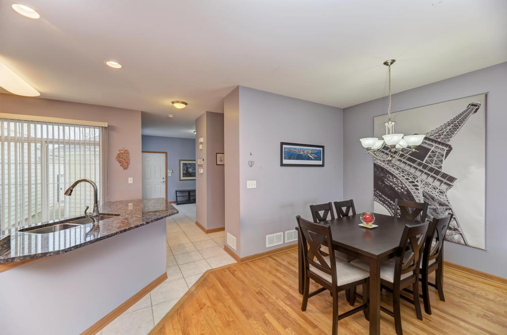 1846 Keystone Place Schaumburg, IL 60193 - Photo 7 of 30 a dining room with furniture and window