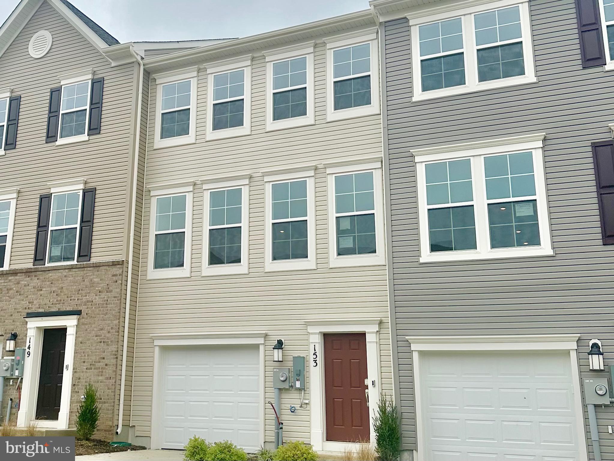 153 Telluride Way Charles Town, WV 25414 - Photo 1 of 21 a front view of a building