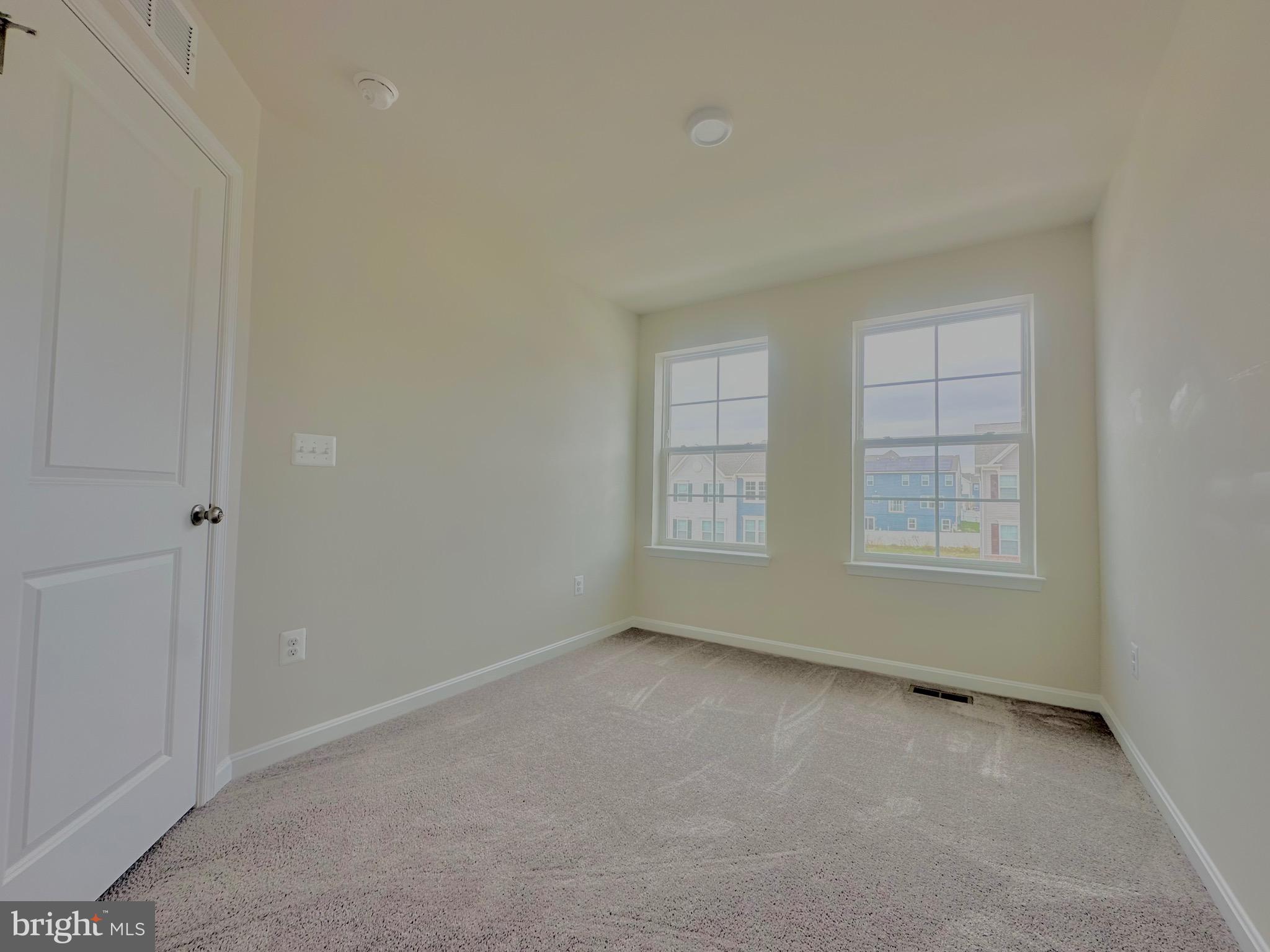 153 Telluride Way Charles Town, WV 25414 - Photo 12 of 21 an empty room with windows