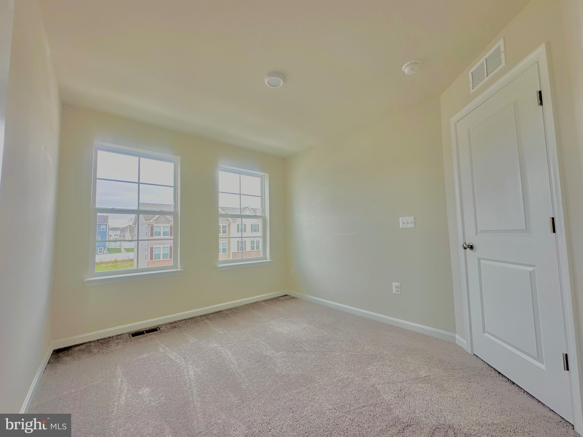 153 Telluride Way Charles Town, WV 25414 - Photo 14 of 21 a view of an empty room with a window