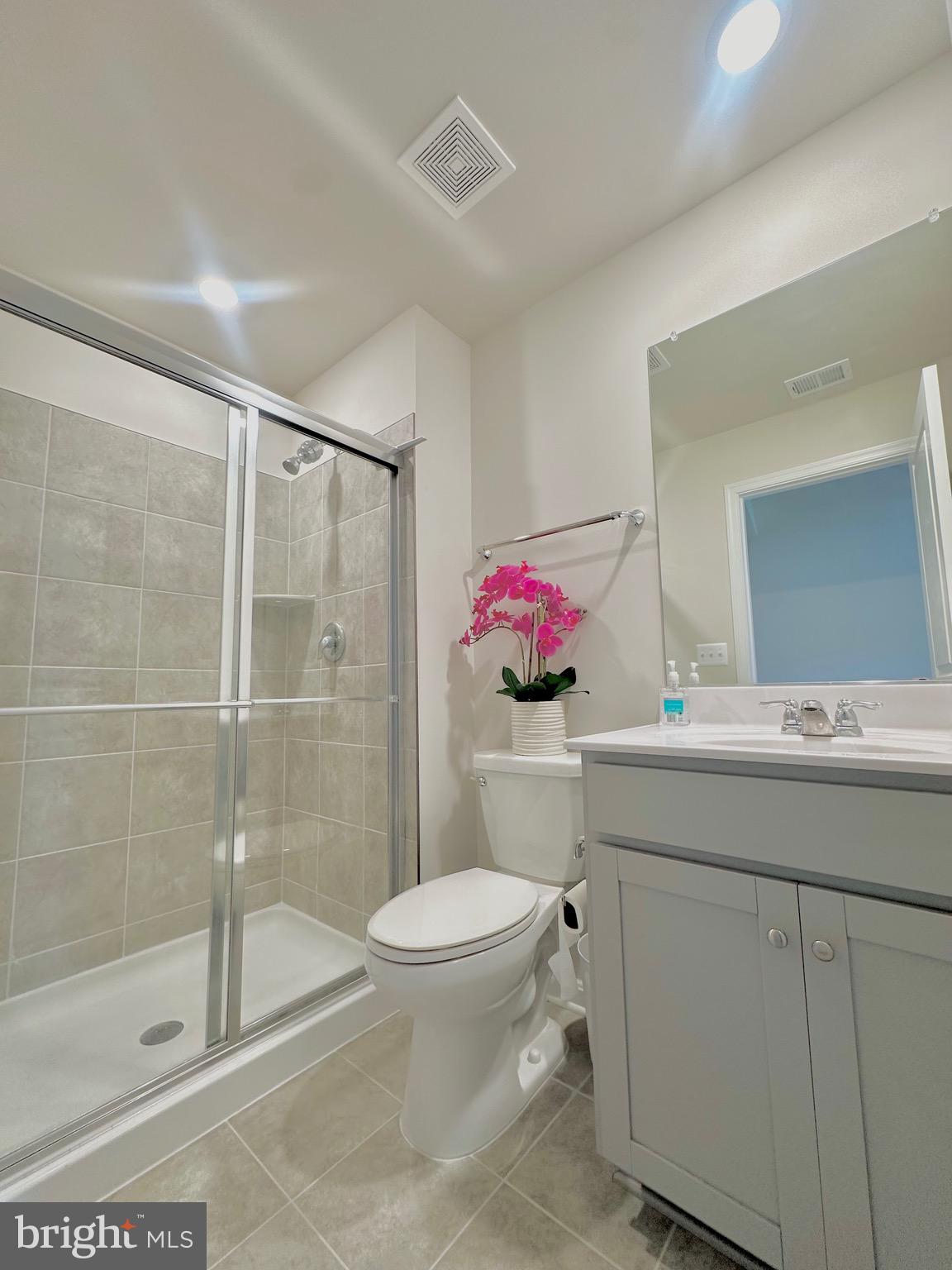 153 Telluride Way Charles Town, WV 25414 - Photo 20 of 21 a bathroom with a sink toilet and shower