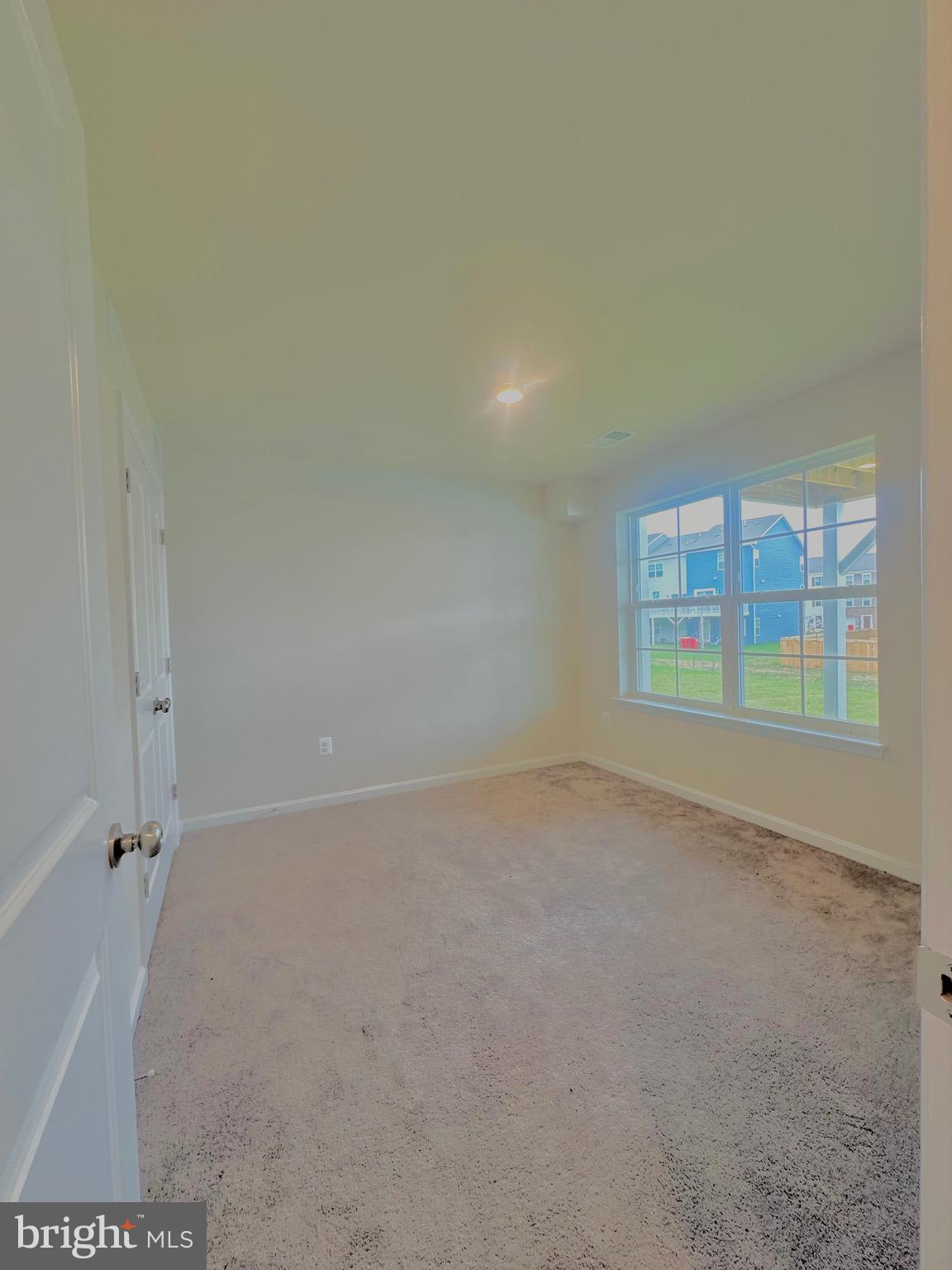153 Telluride Way Charles Town, WV 25414 - Photo 21 of 21 a view of an empty room with a window