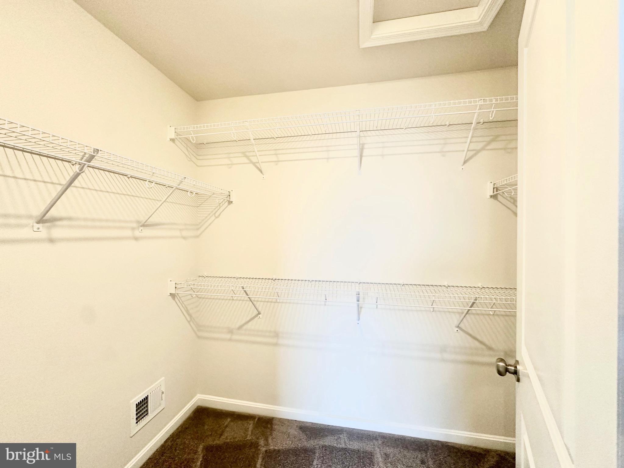 153 Telluride Way Charles Town, WV 25414 - Photo 8 of 21 a view of a rack on the wall