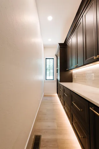 a view of gallery with windows