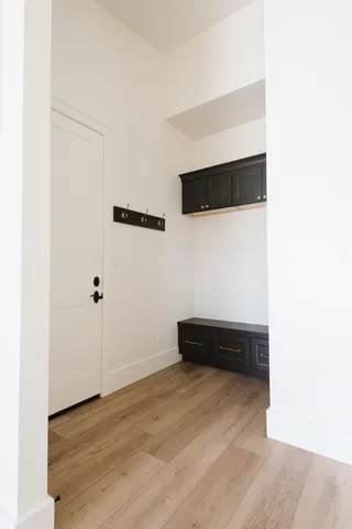 a kitchen with stainless steel appliances granite countertop a refrigerator and a stove