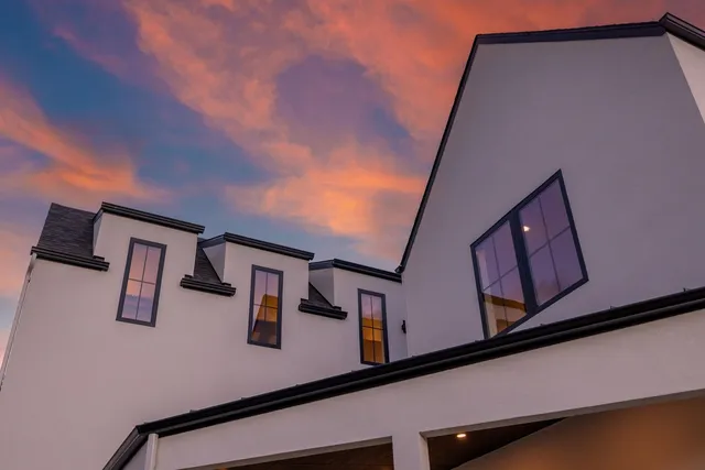 a view of a chair and table in the garden