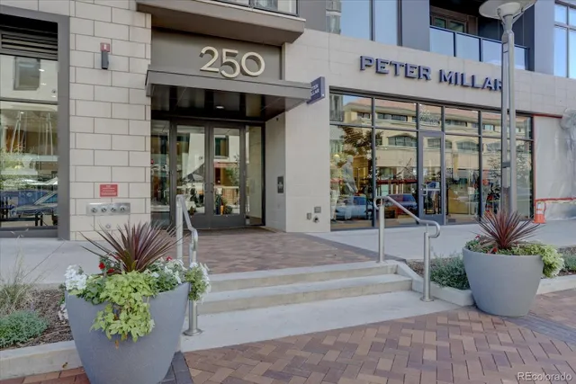 a dining room with furniture and a garden