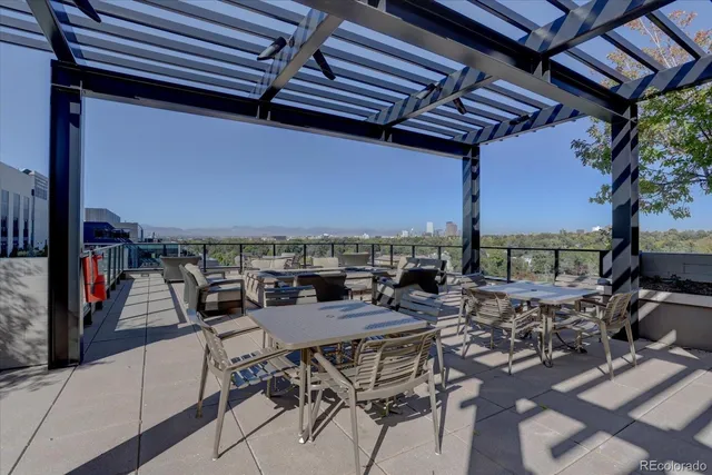 a view of a swimming pool with a patio
