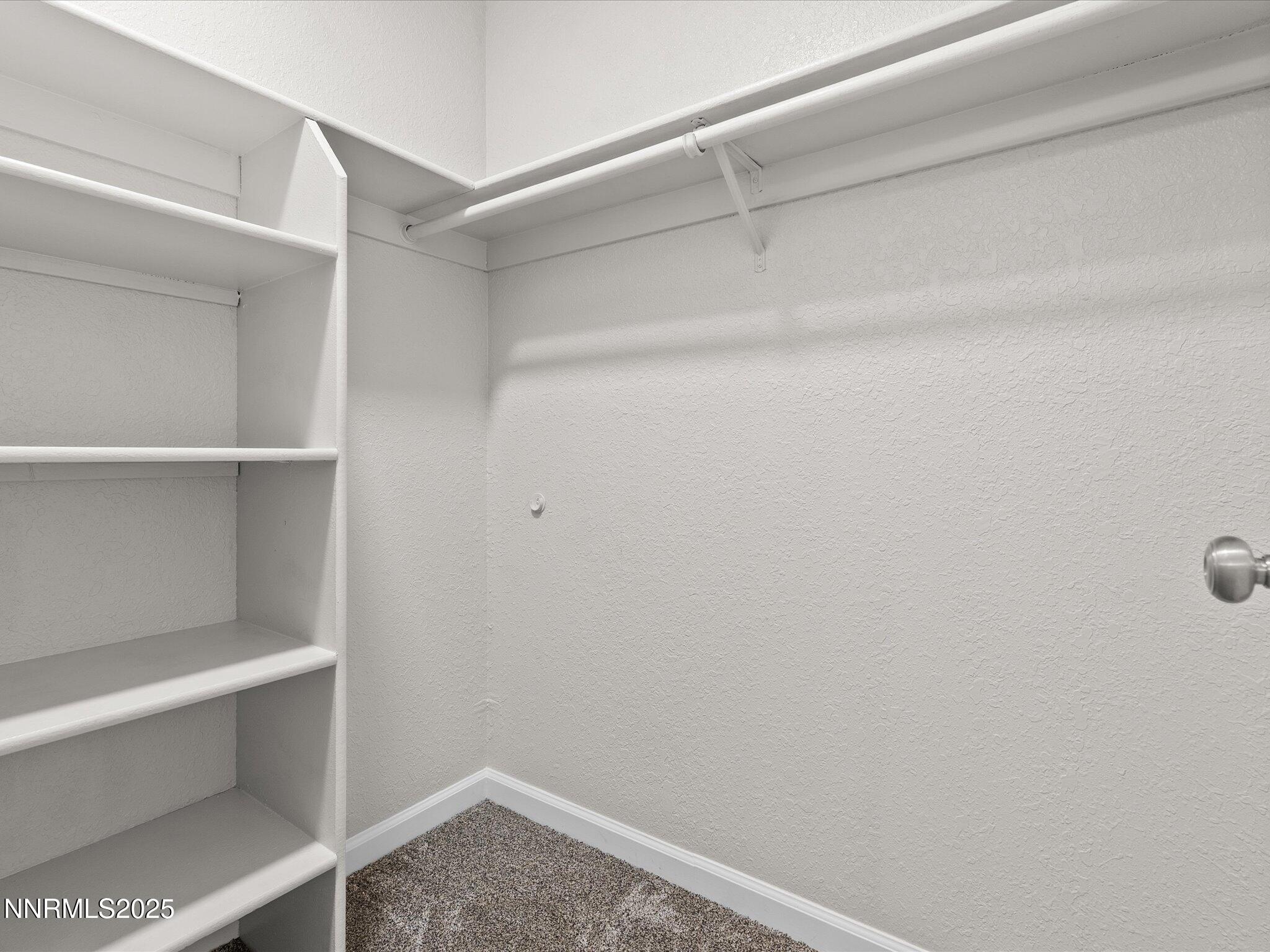 7680 Bluestone Drive, Unit 356 Reno, NV 89511 - Photo 17 of 23 a view of an empty walk in closet