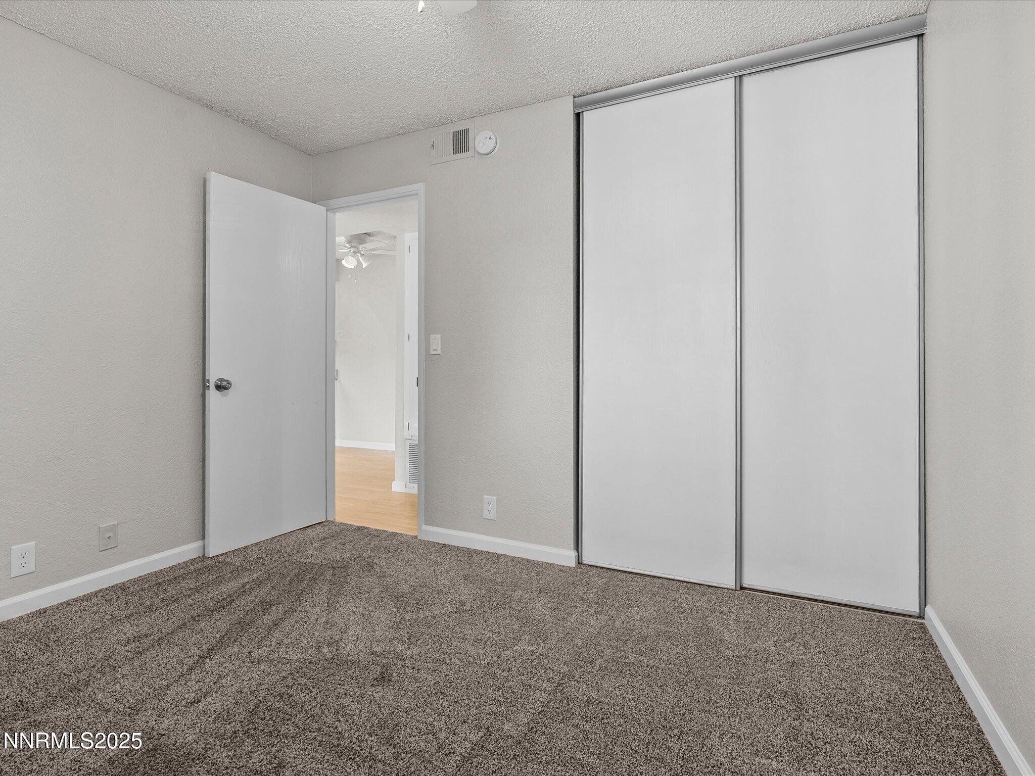7680 Bluestone Drive, Unit 356 Reno, NV 89511 - Photo 19 of 23 a view of an empty room