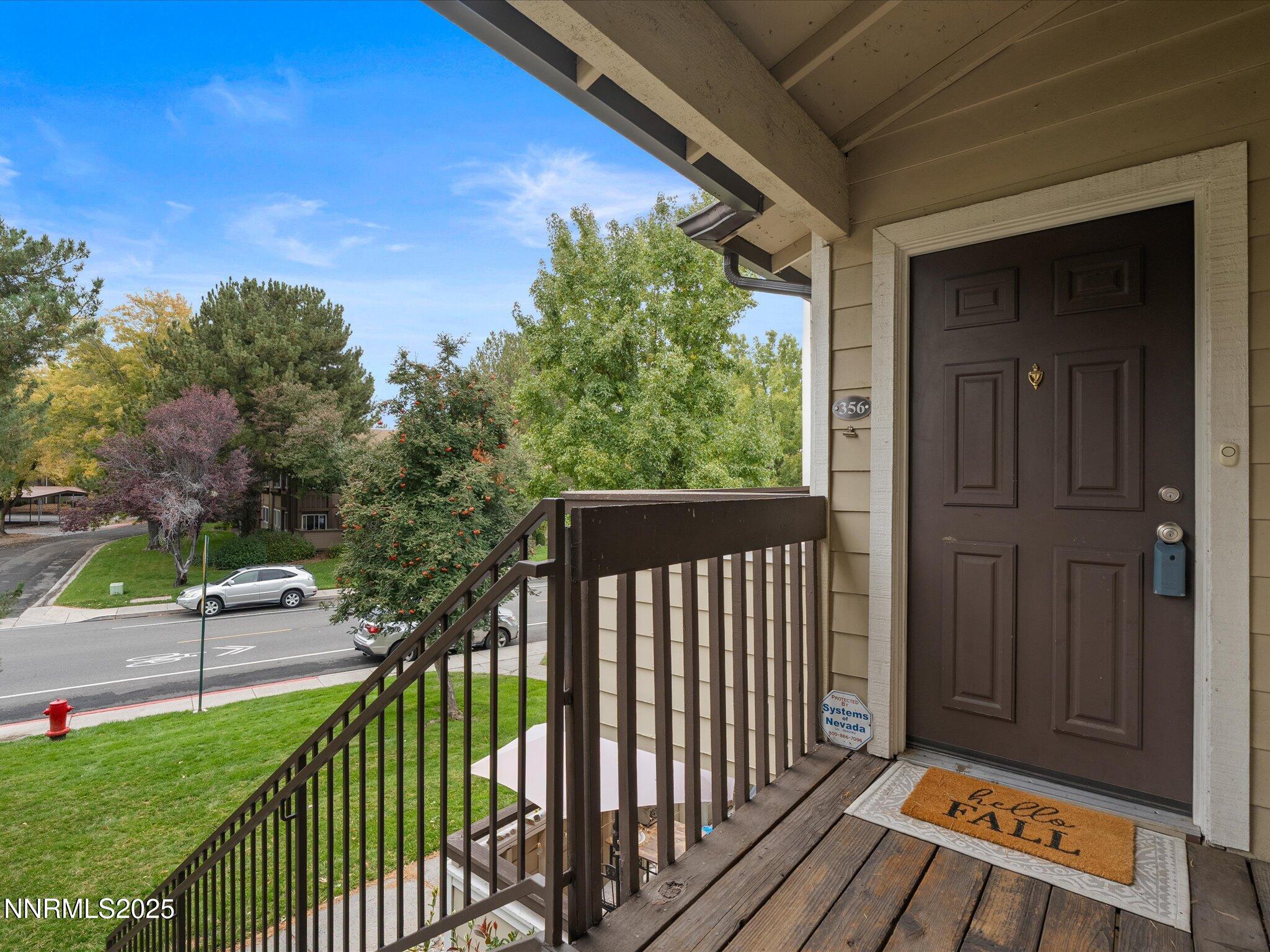 7680 Bluestone Drive, Unit 356 Reno, NV 89511 - Photo 2 of 23 a view of backyard with green space