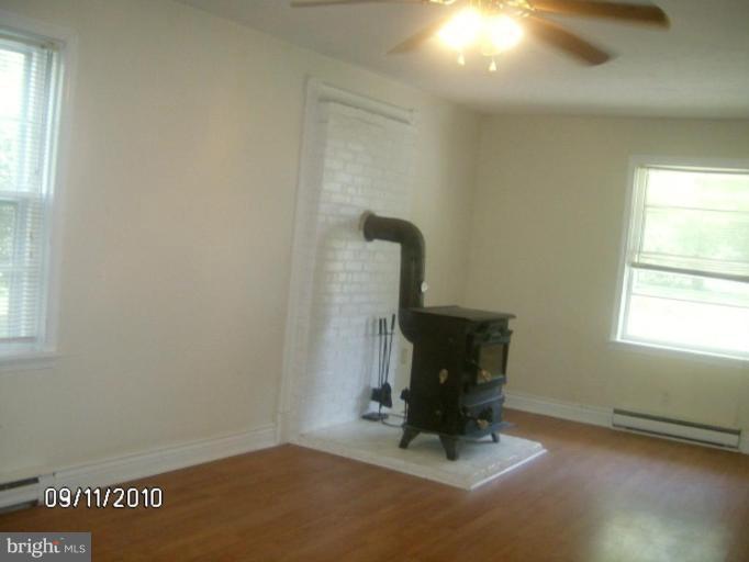 14858 Reva Road Reva, VA 22735 - Photo 5 of 16 Living room with cozy wood stove