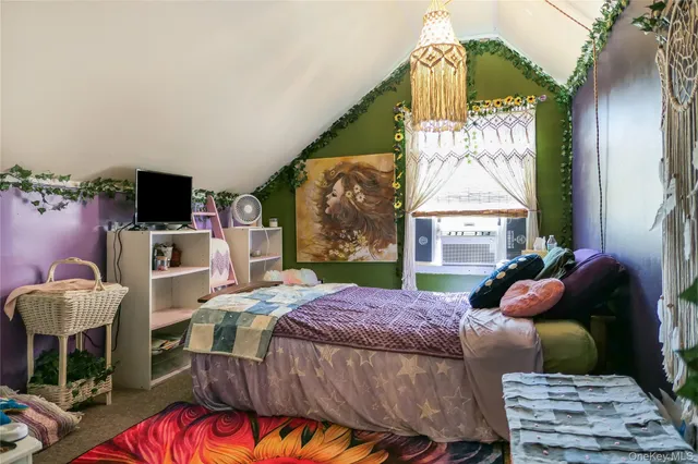 a living room with furniture fireplace and flat screen tv