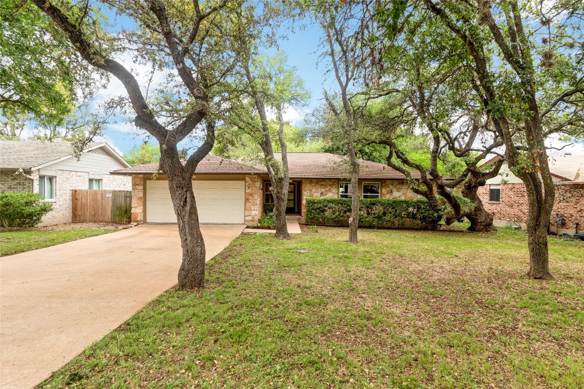 a house with trees in front of it