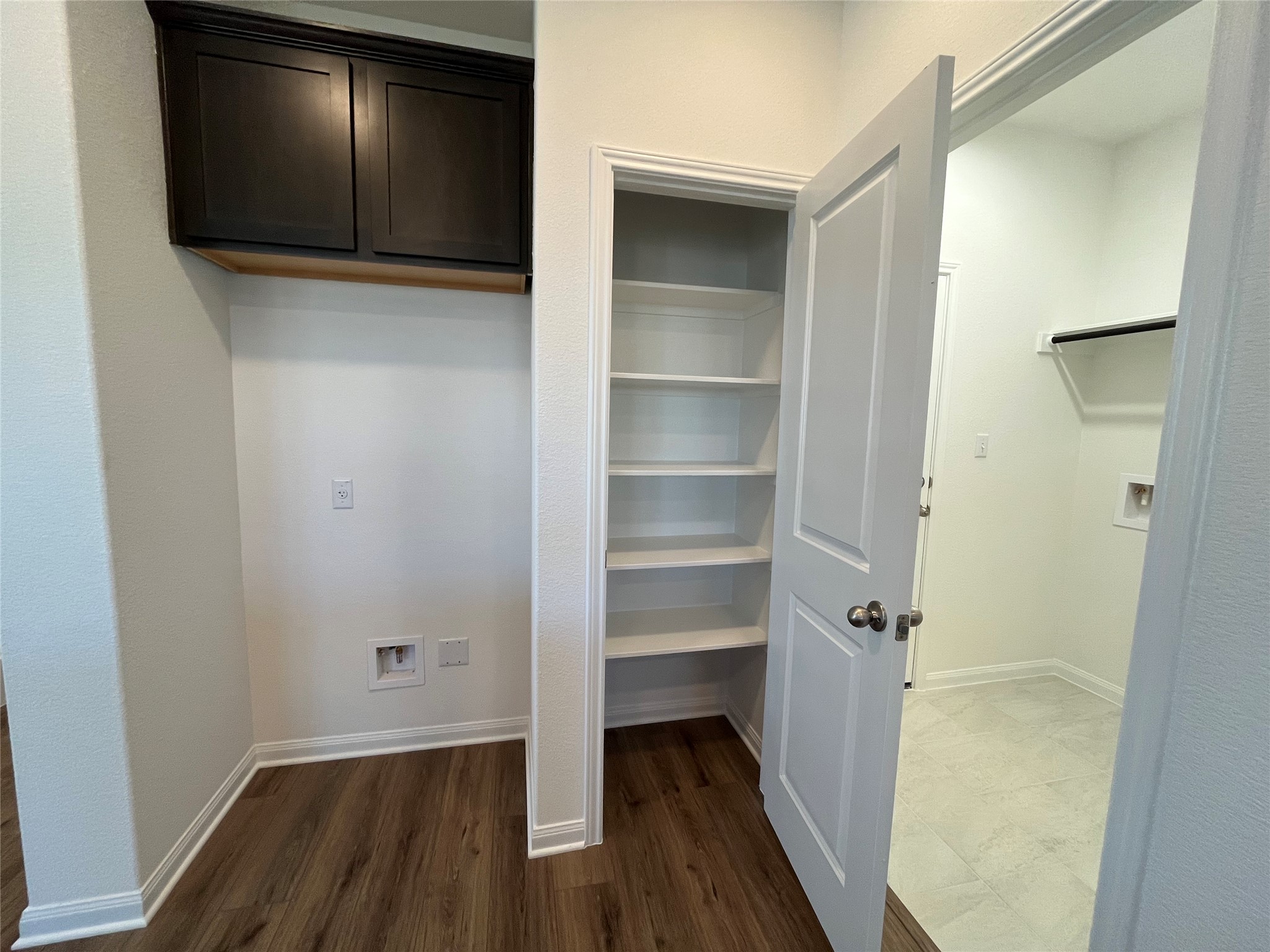 8522 Wellspring Loop Round Rock, TX 78665 - Photo 13 of 36 Kitchen pantry. For demonstration purposes only. This will be the same interior layout. Colors can vary.
