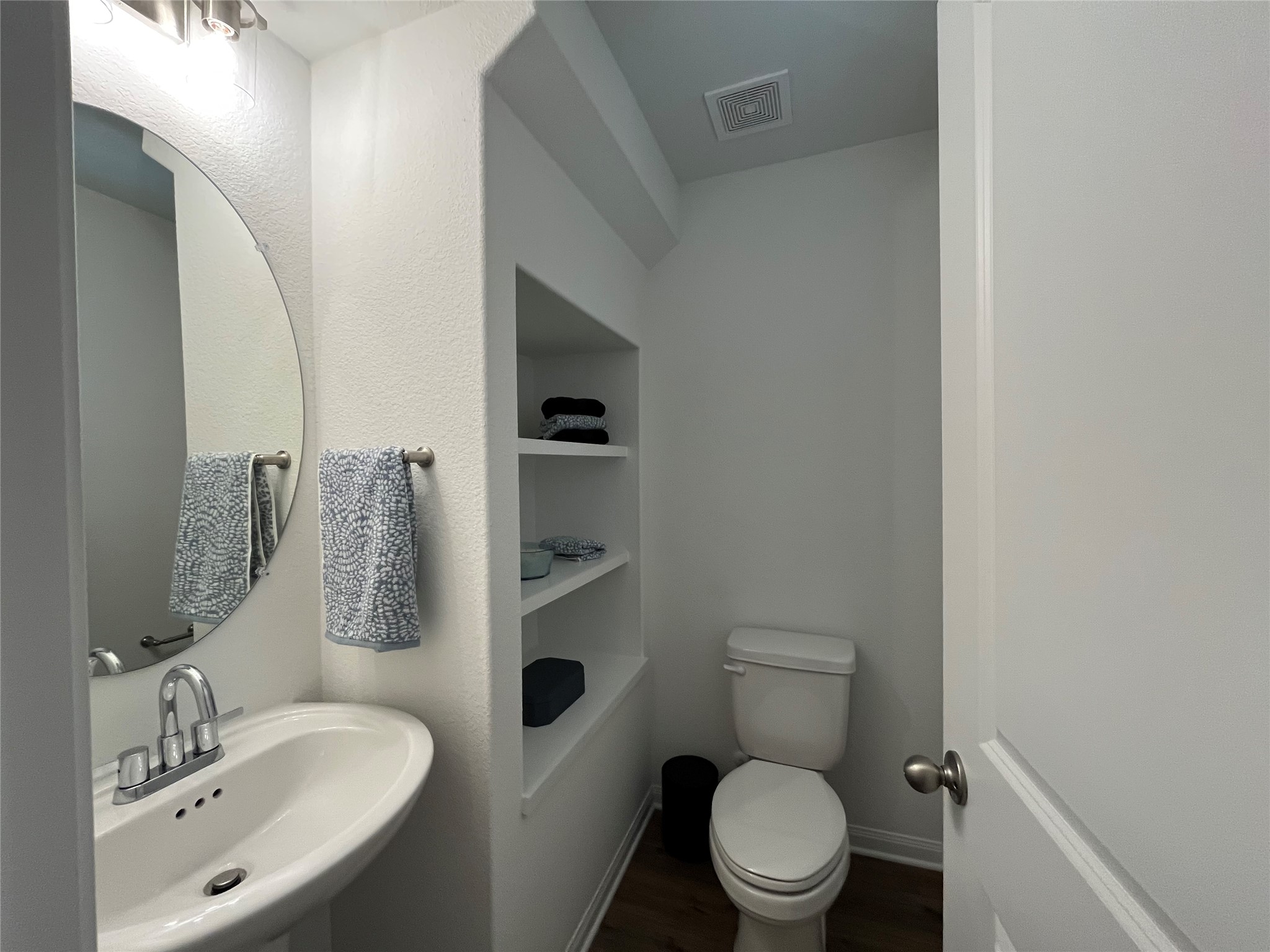 8522 Wellspring Loop Round Rock, TX 78665 - Photo 3 of 36 For demonstration purposes only. This will be the same interior layout. Colors can vary. Half guest bath off entry with deep decorative shelving