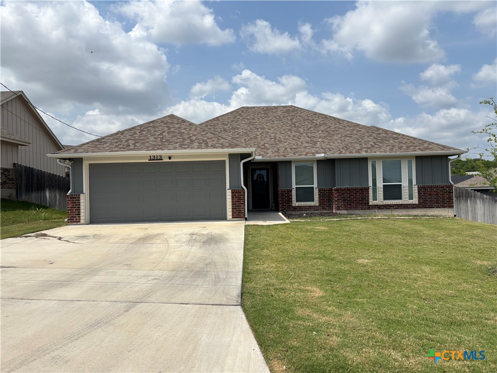 a view of a house with a garden