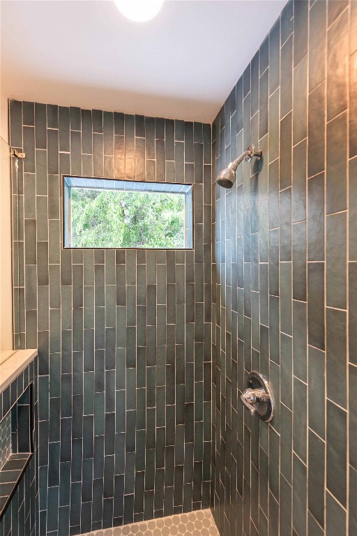 3801 Wilson Street Austin, TX 78704 - Photo 25 of 38 a bathroom with a shower and a window
