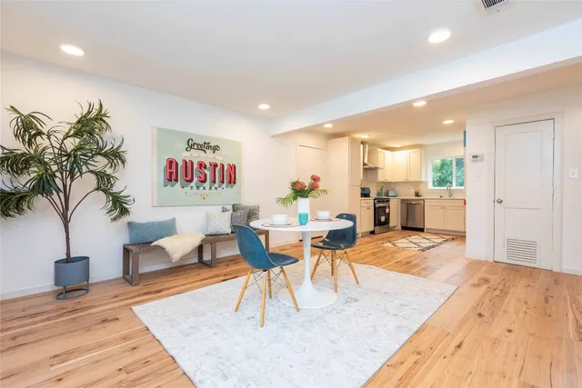 a living room with furniture and a table