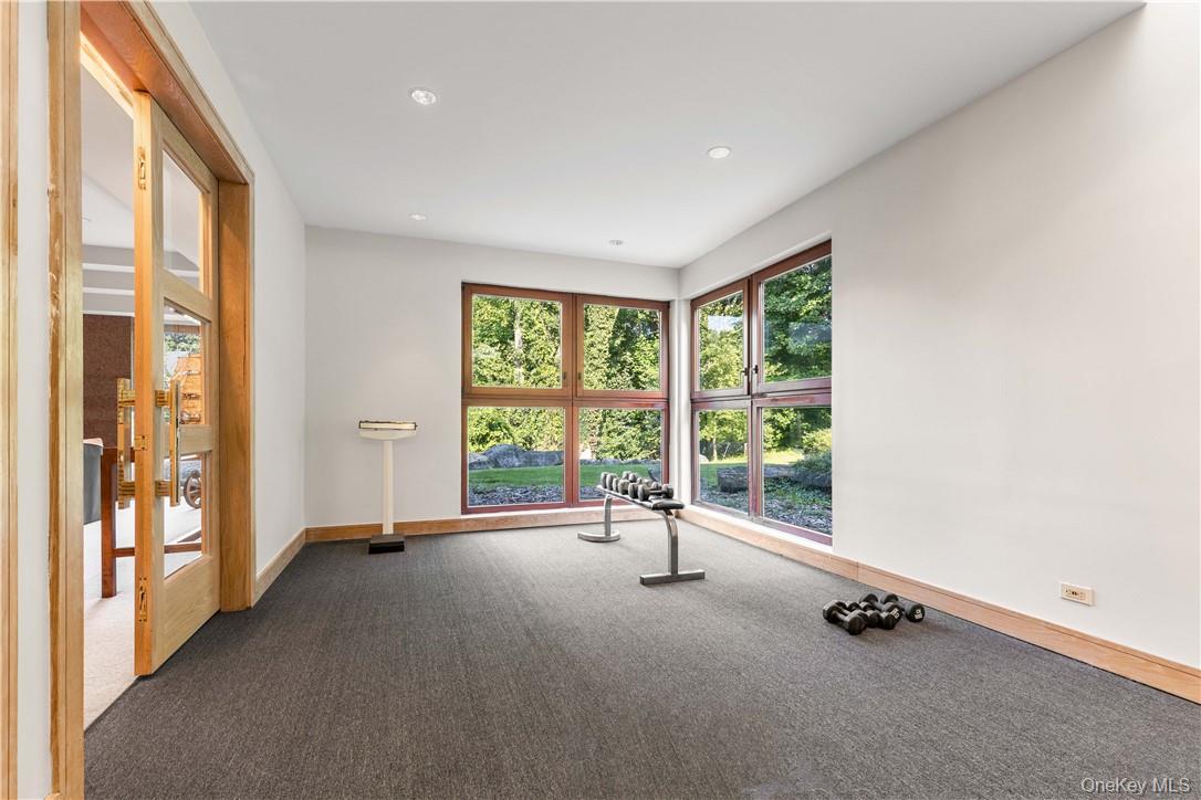 40 Polly Park Road Rye, NY 10580 - Photo 32 of 36 a view of room with floor to ceiling windows