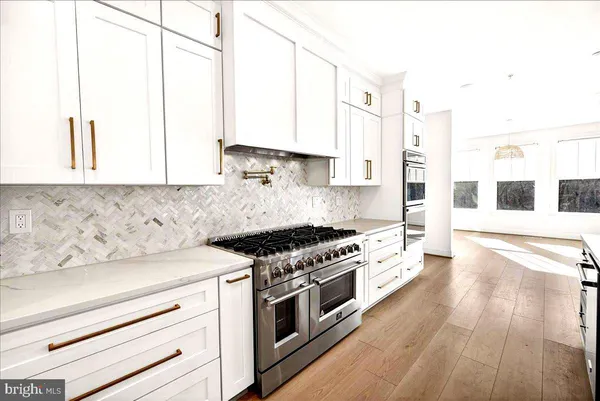 a view of a living room with a flat screen tv
