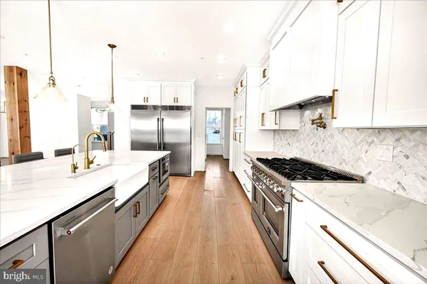 a bathroom with a sink vanity and a mirror