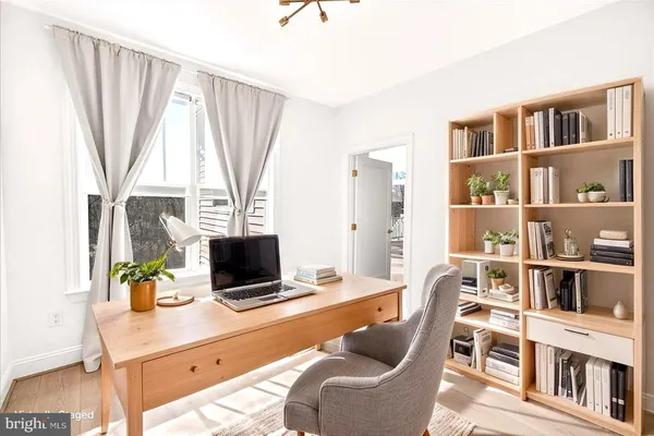 a view of wooden floor in an empty room