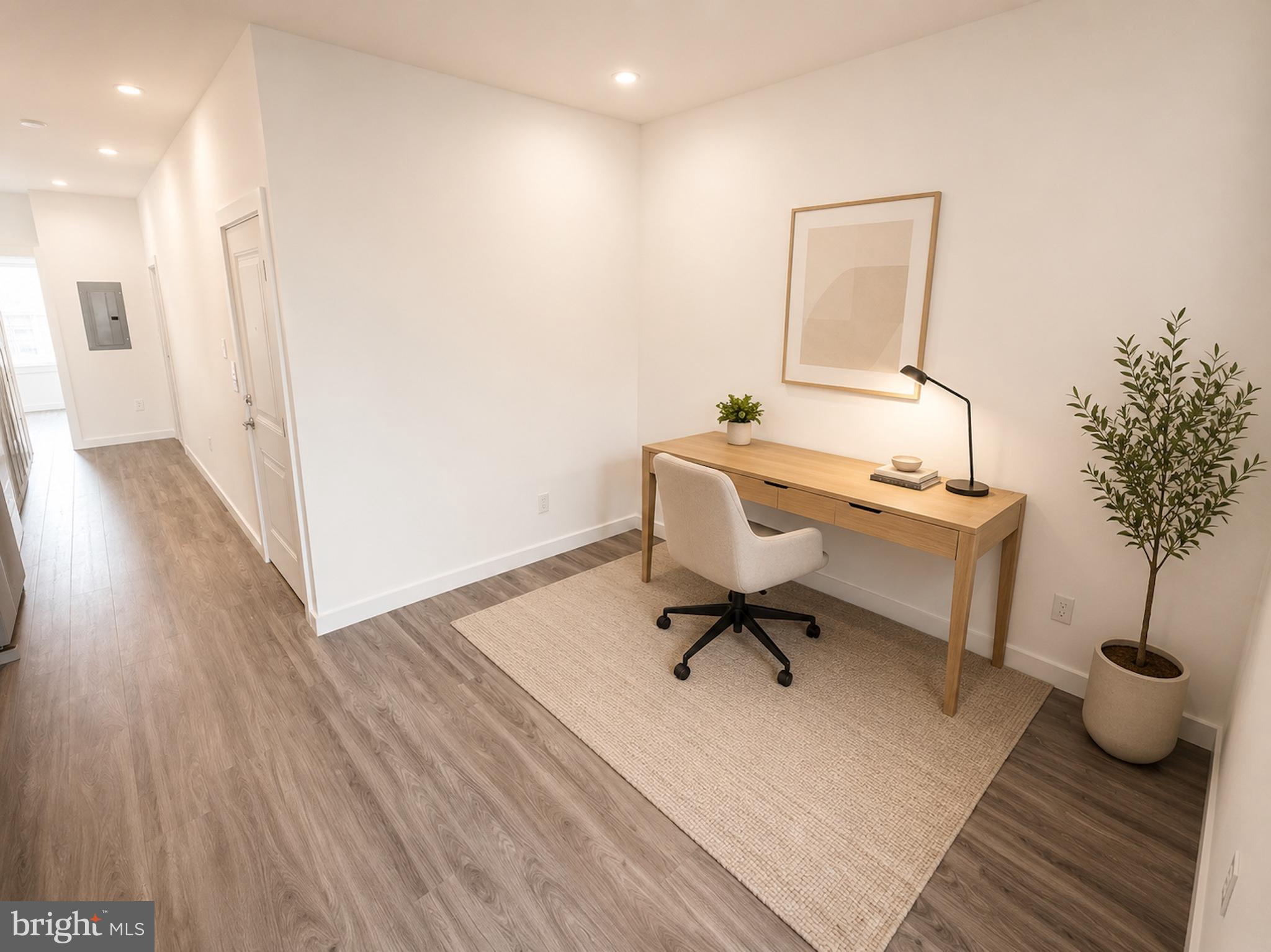 2614 North 7th Street, Unit 2 Philadelphia, PA 19133 - Photo 8 of 10 a workspace with furniture and wooden floor