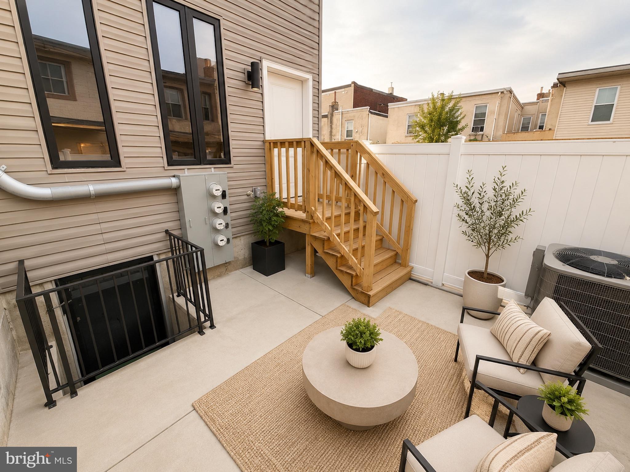 2614 North 7th Street, Unit 2 Philadelphia, PA 19133 - Photo 10 of 10 a view of a patio with couches table and chairs
