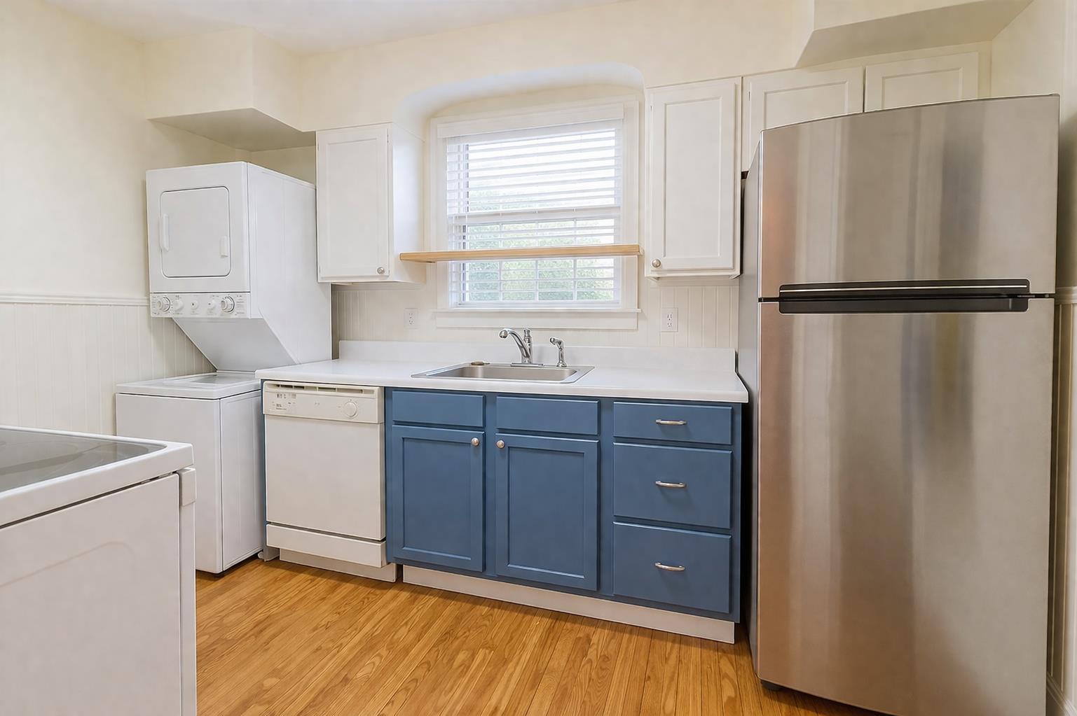 705 Loeb Street Memphis, TN 38111 - Photo 11 of 16 a kitchen with a refrigerator sink and cabinets