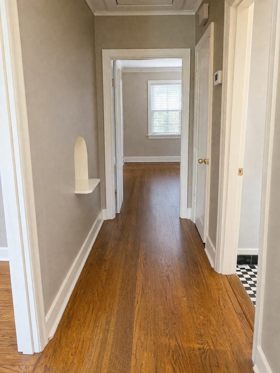 705 Loeb Street Memphis, TN 38111 - Photo 12 of 16 a view of a hallway with wooden floor