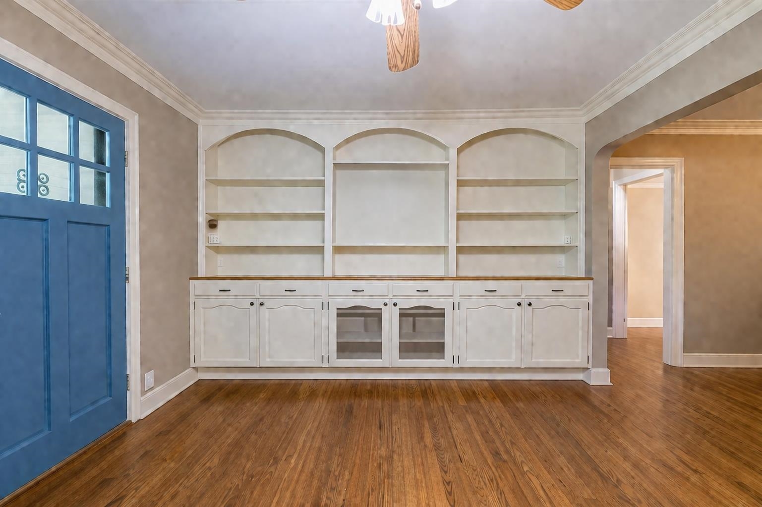 705 Loeb Street Memphis, TN 38111 - Photo 5 of 16 a view of a livingroom with wooden floors and cabinet